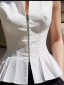 Blusa sin manga elegante cuello alto, con cremallera y acampanado bajo