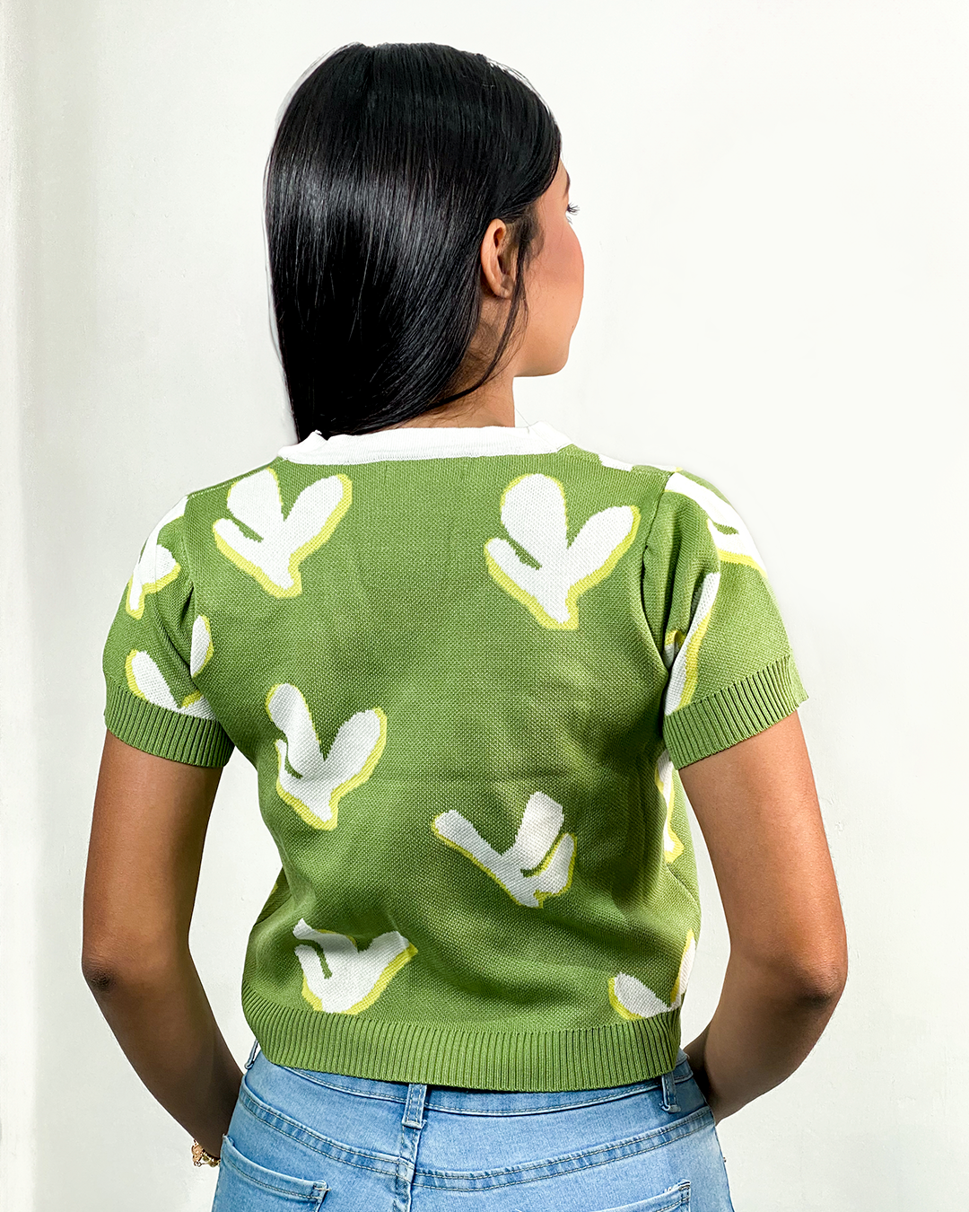 Blusa tejida con diseño de perlas